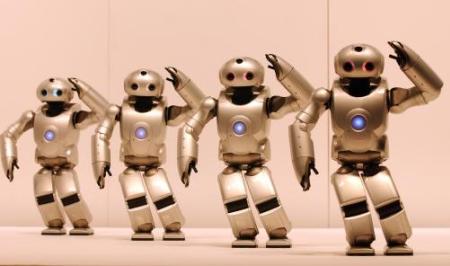 four sony robots salute the audience
